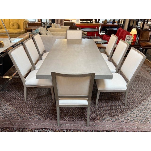 Design Plus Gallery presents a Dining Room Set from Restoration Hardware. There is a group of eight chairs that encompass...