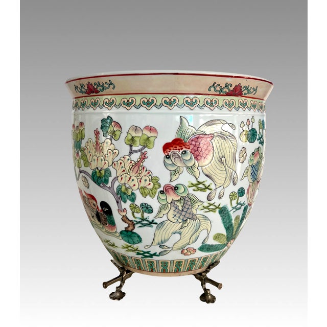 Exceptional Chinese Porcelain Fish Bowl Planter, waisted form gently tapering to bottom rim. Painted carefully in a...