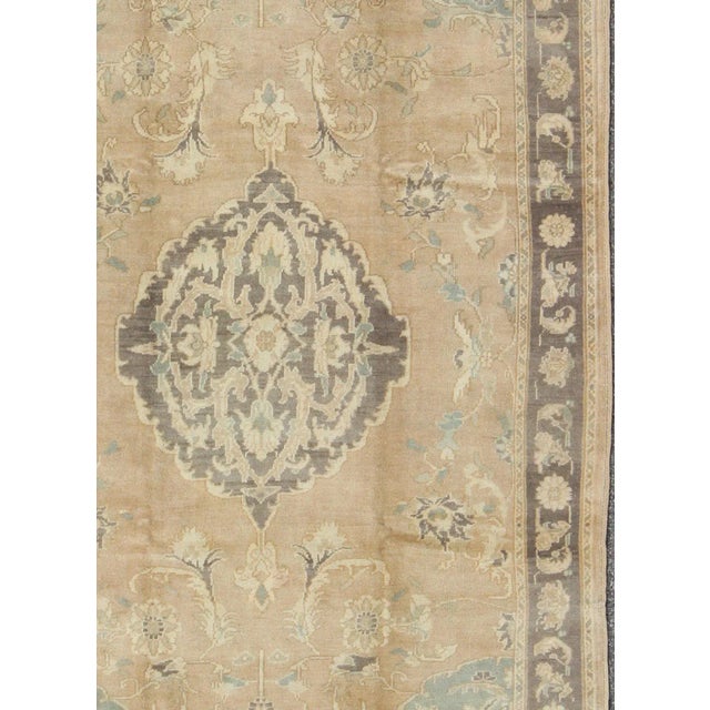 Measures: 6'4 x 9'9. Vintage Turkish Oushak Rug in Taupe, Gray, and Pale Blue with Central Medallion. Keivan Woven Arts /...