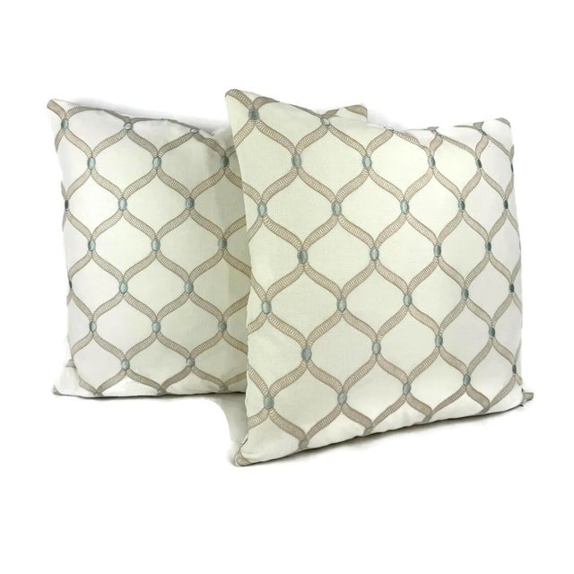 From Stout Fabrics is FERRY in the color Opal pillow cover. This pillow features a cream base with a tan...