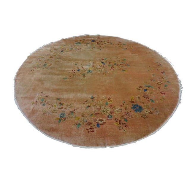 Antique Chinese Art Deco Wool Coral Hand Knotted Pile Round Rug, Country of Origin: China, Circa Date: 1920s. This...