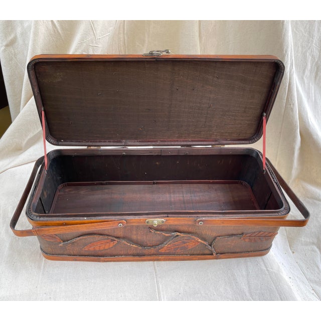 Split Bamboo Decorative Lidded Basket with locking latch. Raised relief leaf and branch pattern throughout. Can be used...