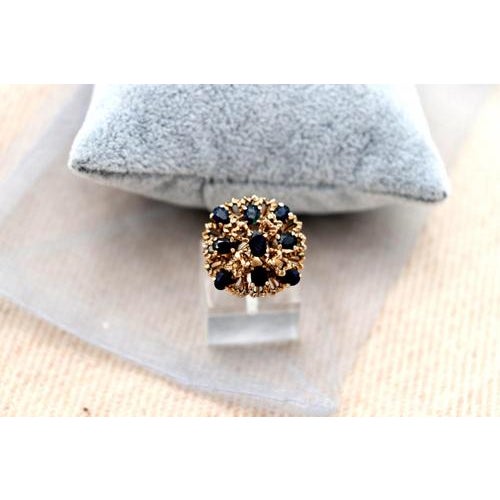 Gold ring in the shape of a shower with nine applied Australian sapphires. Metal: Gold. Origin: Portuguese. Brand: Absent....