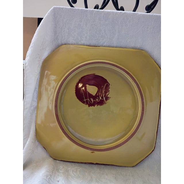 pottery charger plate handcrafted and signed by renowned American ceramicist Karen Howell. This heavy stoneware piece...