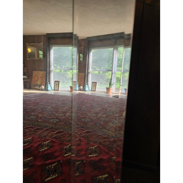 A very fine whistle clean original vintage mid century modern era mirror circa 1950s . Having superb mirror glass with...