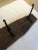 A functional and rustic antique hanging wall coat hanger made from a live edge hunk of impressive wood and having...