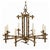 A vintage Hollywood Regency style eight light chandelier in bronze faux bamboo form. The chandelier features eight...