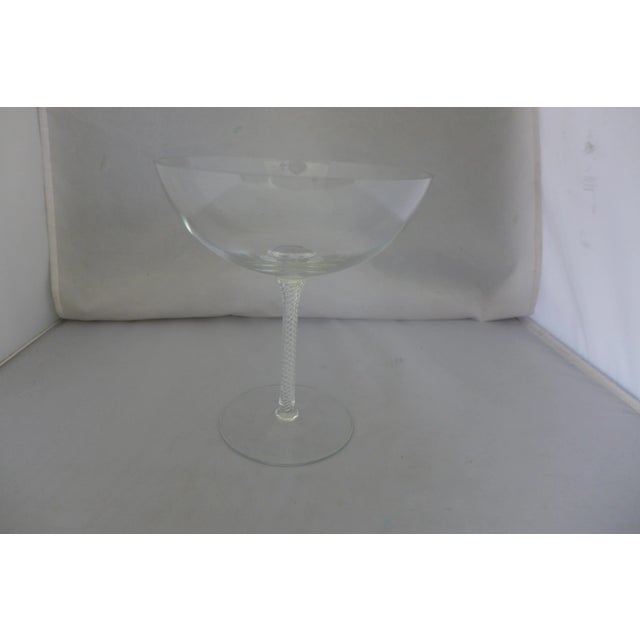 Elegant crystal compote with braided base. Makers mark reads "Ceskci" 6'D X 7"H X 3.75"D Base