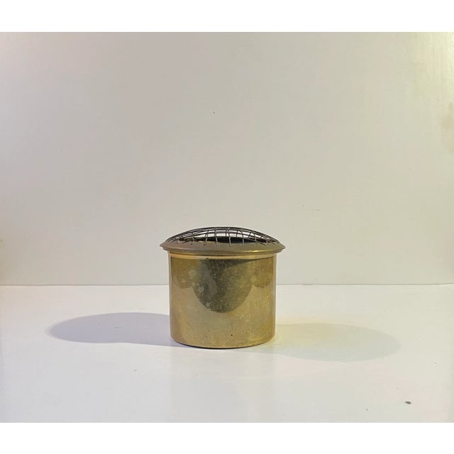 Raw industrial looking and brutally styled urn or lidded vase for flower arrangement or incense. Both the wire lid and...