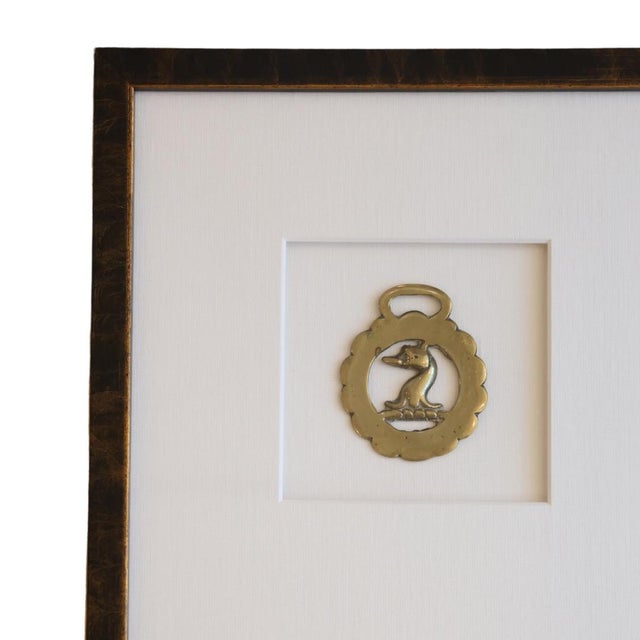 This charming antique horse bridle medallion, hailing from 19th century France, showcases a finely detailed duck design,...