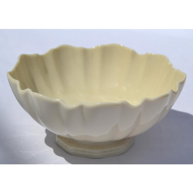 1980s Lenox Symphony Bowl, “Special” edition, is a collectible fine porcelain bowl featuring an ivory base with 24K gold...