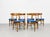 Set of six Mid Century Modern teak dining chairs crafted in Denmark by Farstrup Møbler, c. 1960's. Designed with timeless...