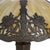 This antique table lamp, attributed to Royal Art Glass Co., features a distinctive 6-panel slag glass shade. The shade is...