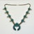 Vintage Home is pleased to present this gorgeous vintage Zuni Native American Squash Blossom Beaded Necklace from the...