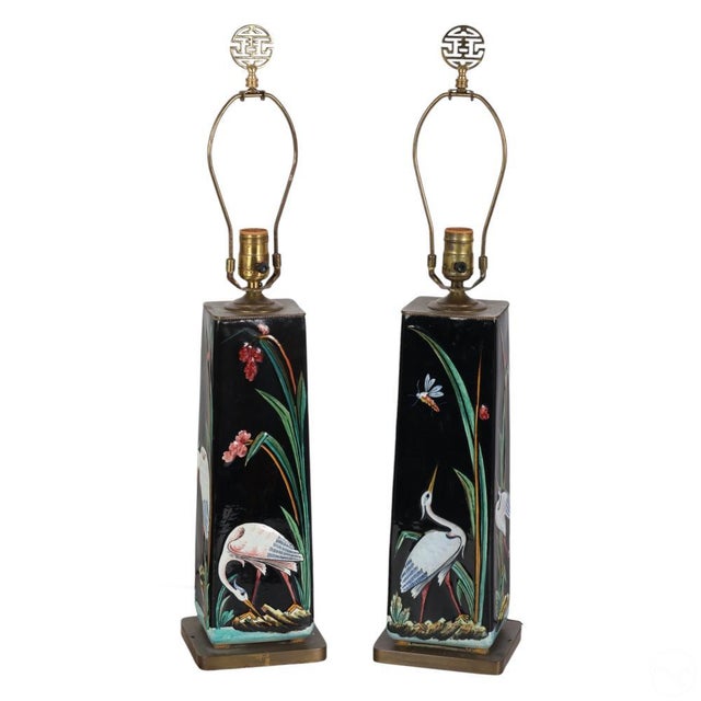 A stunning pair of Italian Majolica bird-themed lamps from the 1940s. The lamps feature dark black high-gloss majolica as...