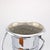 An Art Deco period champagne cooler from France circa 1930. The elegant wine bucket is made of nickel plated brass with...