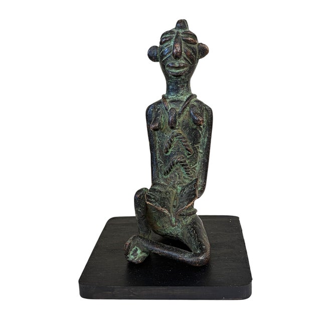 This 5.75" tall Benin bronze statue of a seated woman with a book stands 6.25" H with stand (2" W × 3" D). A must-have for...