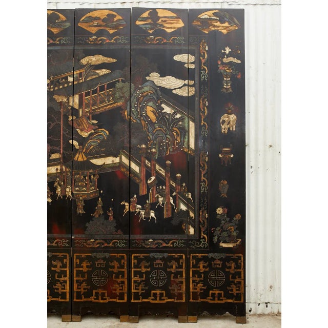 Early 20th Century Chinese Qing Twelve Panel Lacquered Coromandel Screen For Sale - Image 5 of 13