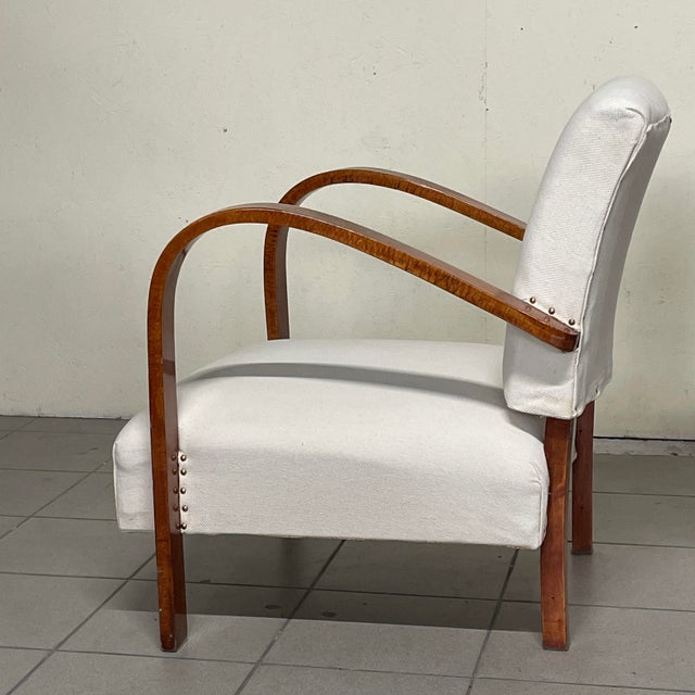 A pair of Art Deco bentwood armchairs, Italian-made, dating back to the first half of the 20th century, 1930s or 1940s....