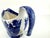 An elegant, very old blue and white ceramic gravy boat, crafted by E.B. & J.E.L. in England. Featuring an intricate...