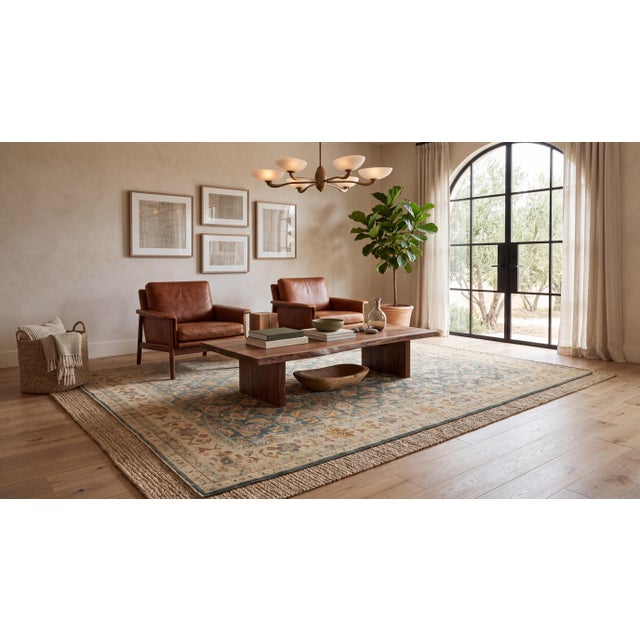An exquisite example of classic luxury design, this antique Persian-style Agra wool rug showcases an intricate, allover...