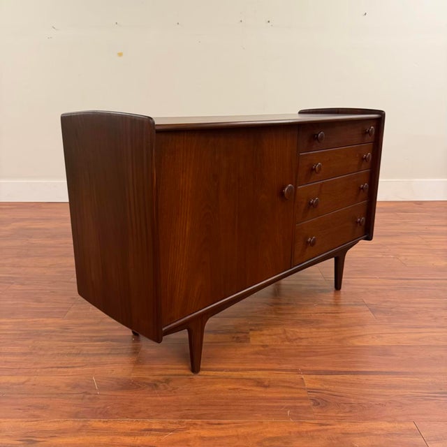 Beautiful vintage compact sideboard designed by John Herbert for A. Younger Furniture, winner of a 1960 Furniture Makers'...