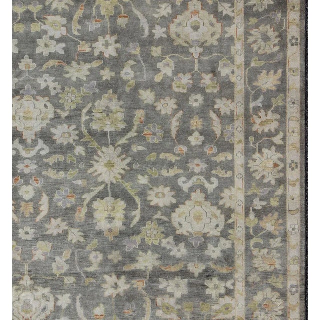 Modern Gray Background Oushak With All-Over Floral Design in Green and Orange For Sale - Image 3 of 7