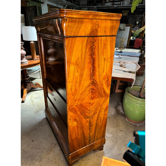A magnificent mid 19th century circa 1841 continental chest secretaire slant top with figured bookmatched walnut mahogany...