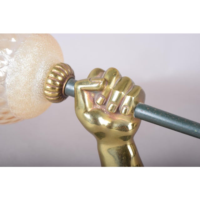 Bronze Fist Wall Sconce with Amber Glass Shade in the style of Maison Jansen, 1950s For Sale - Image 4 of 9