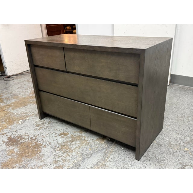 Design Plus Gallery presents the Reed Dresser by Blake Tovin for Crate & Barrel. The dresser showcases four drawers all in...