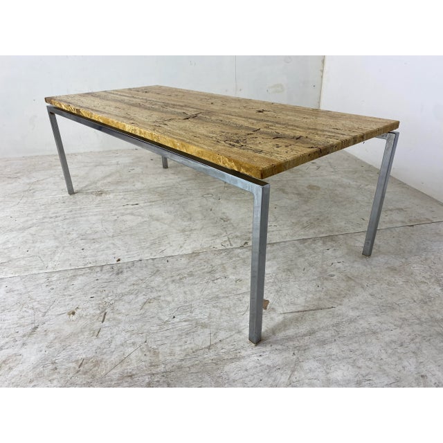Vintage, Modernist, Italian, Mid-Century Chromed Metal and Travertine coffee Table, 1950s. With beautiful grain in the...