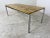 Vintage, Modernist, Italian, Mid-Century Chromed Metal and Travertine coffee Table, 1950s. With beautiful grain in the...