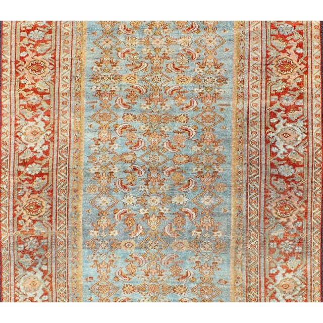 Ornate flower design Bidjar antique Persian rug in a variety of colors of red and blues. Keivan Woven Arts / rug ema-7556,...