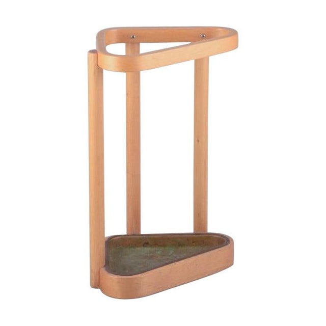 Alvar Aalto for Artek, Finland. Umbrella stand in birch and brass. Model 115. from the 1960s/70s. In excellent condition...