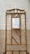 Antique tiger bamboo umbrella stands with a decorative square centerpiece. This stand features three slots for storing...