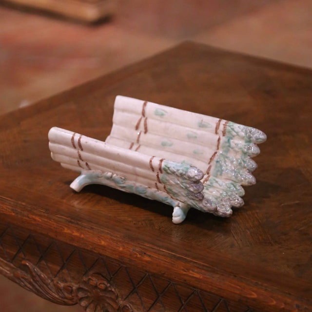 Decorate a table or kitchen surface with this charming antique French majolica vessel, crafted circa 1920 and modeled in...