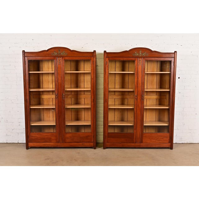 A beautiful pair of antique French Empire bookcases or display cabinets In the manner of Herter Brothers USA, Circa 1890s...