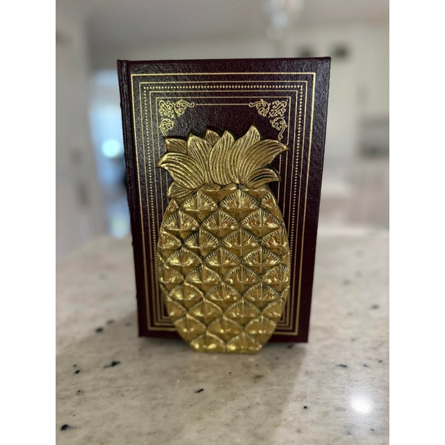 Description: Bring a touch of vintage tropical elegance to your bookshelf, console, or collected interior with this...