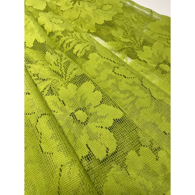 Gorgeous square floral tablecloth. The pattern is floral with sheer mesh.