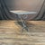 Charming French café table featuring a rectangular marble top with beautifully figured veining, raised on an elegant cast...