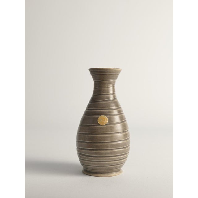 This scandinavian modern stoneware vase attributed to Ewald Dahlskog for Bo Fajans is extremely elegant. It is labeled and...