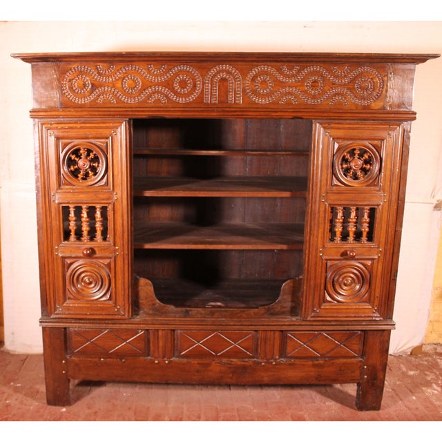 A fine wardrobe or cupboard of the 17th century in oak and turning in boxwood other times alcove bed transformed into a...