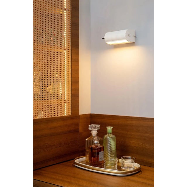Charlotte Perriand 'Applique Cylindrique Petite' Wall Lamp in White. Perriand's iconic 'Applique Cylindrique' features a...