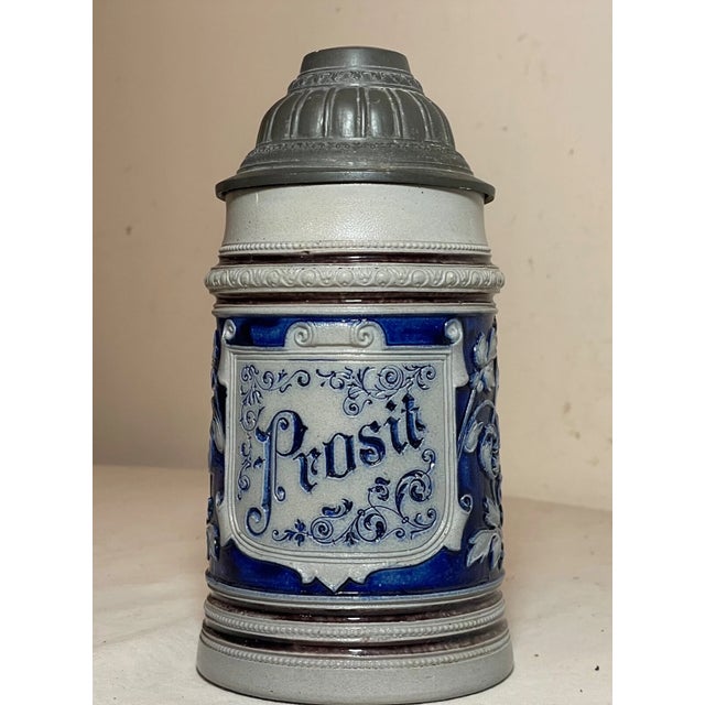 Up for sale is a nice quality antique lidded Westerwald German pottery beer stein. It's made out of thick pottery walls...