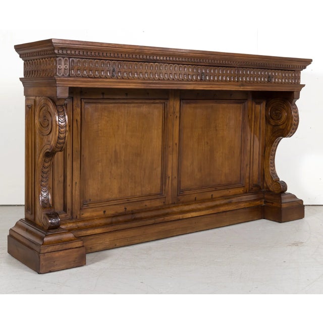A handsome 19th Century Spanish Renaissance style carved walnut console from the Catalan region, circa 1890s, having a...