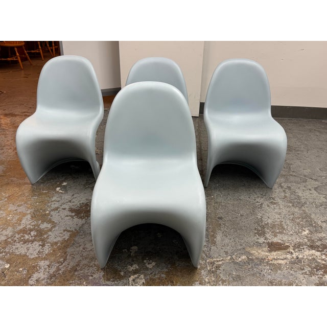 Design Plus Gallery presents a Set of Four Panton Chairs by Verner Panton from Vitra. An icon of modern furniture design,...