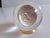 The 1972 Eisenhower One Dollar Coin Crystal Ball Style Acrylic Paperweight is a unique and decorative collectible item....