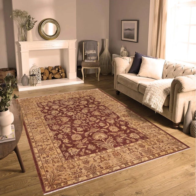 "Enhance the ambiance of your home with this magnificent Persian-influenced Turkish hand-knotted rug made by skilled...