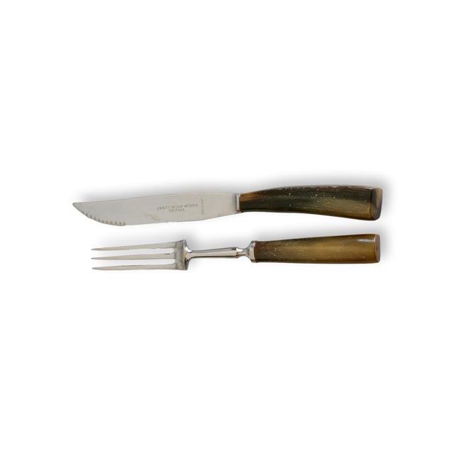 A handsome antique English steak set including six knives with sharp Sheffield blades and six forks. Each with natural...