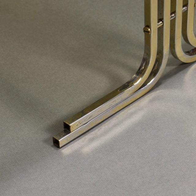 Amazing set of three gold colored Italian nesting tables. The set resembles a Great Gatsby or Hollywood Regency style....